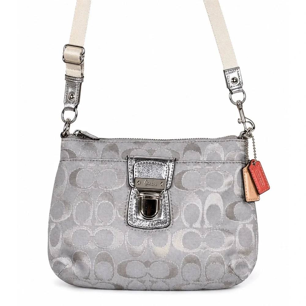 Coach Poppy Signature Metallic Swingpack Crossbody Bag Dove Grey 47018